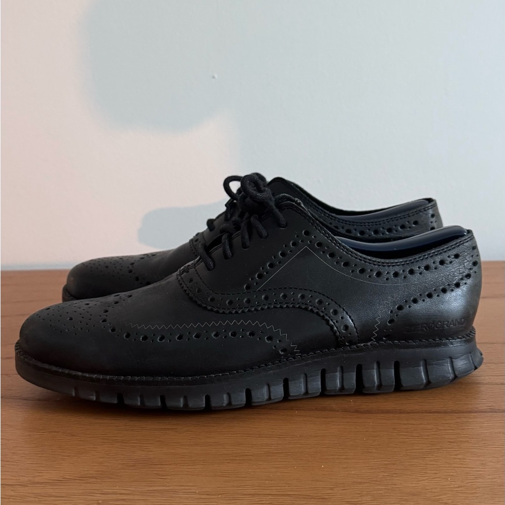 Cole Haan black leather shoes.